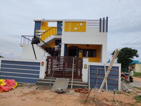 House with compound wall and decorative gate at the finishing stage, VK Builders project