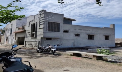 Unpainted building exterior at the construction stage, VK Builders site