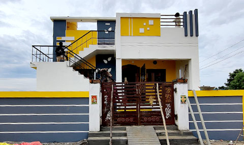 Completed white and lavender house, side elevation view, VK Builders project