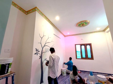 Workers painting a wall mural and ceiling cornice detail, VK Builders painting work